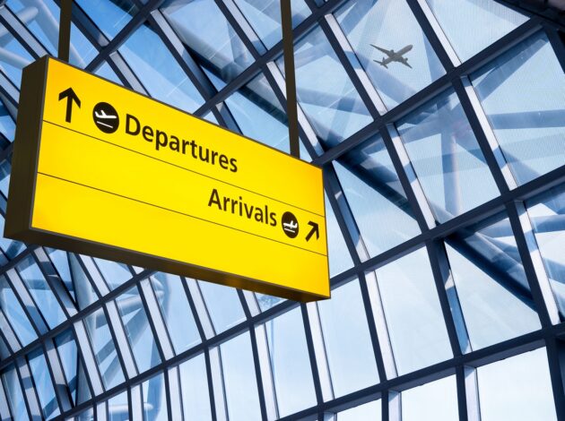 Departures and Arrivals sign at airport