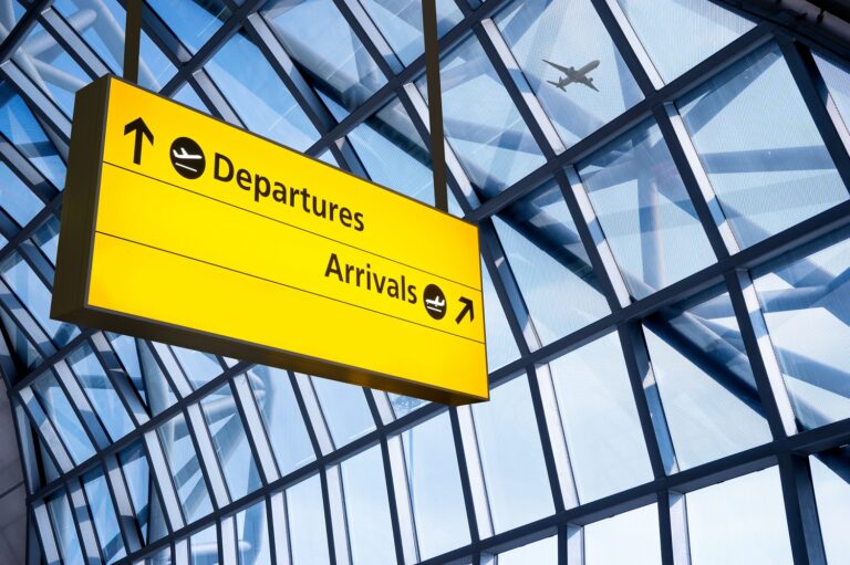 Departures and Arrivals sign at airport